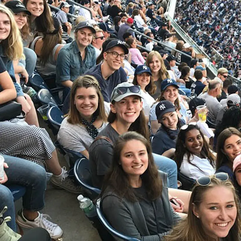 A group of students watching a sports event