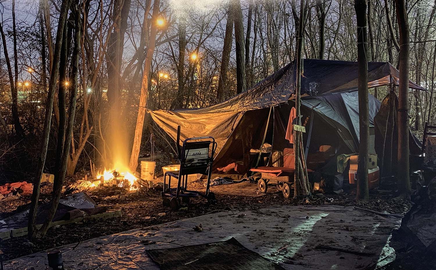 campsite at dusk with fire going